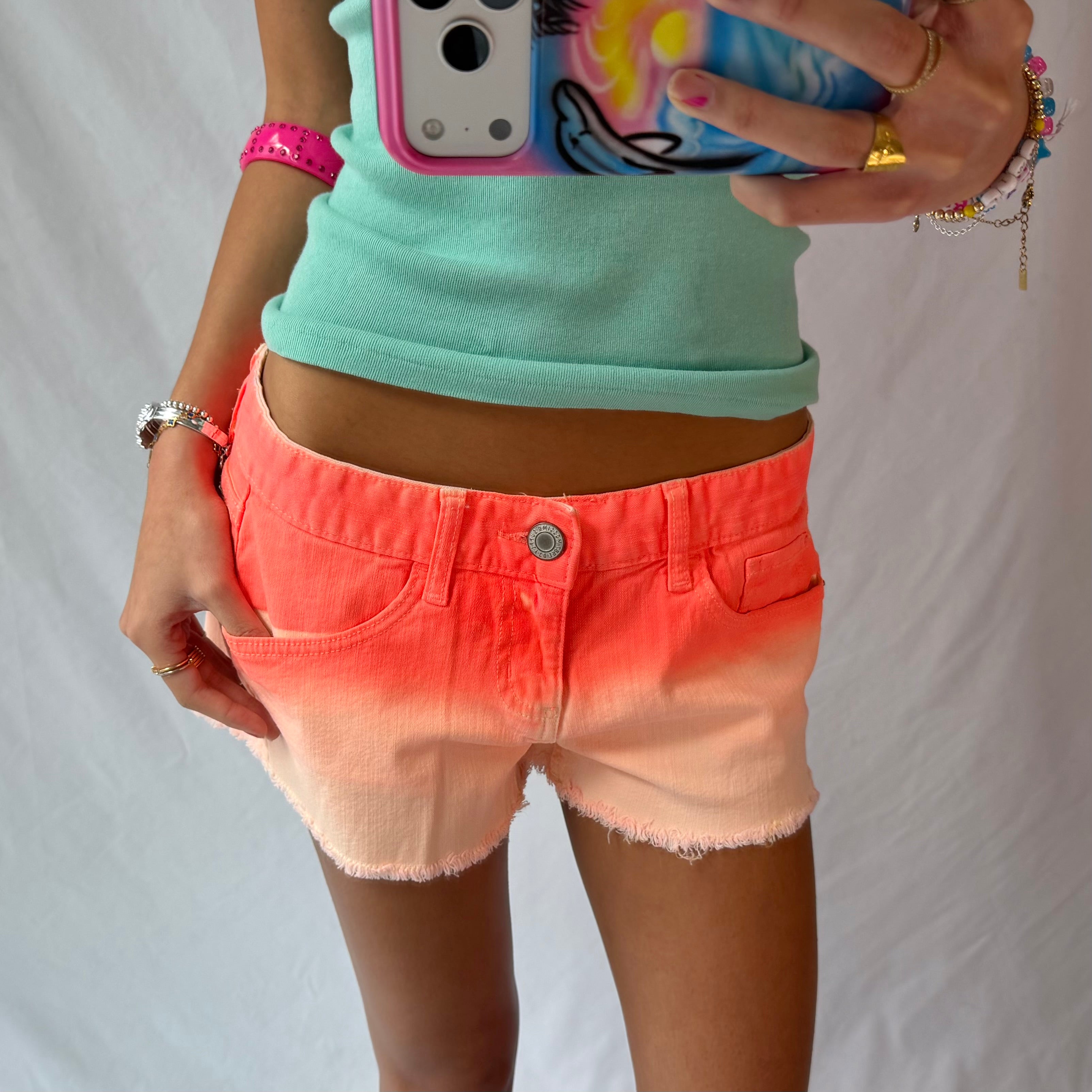 2016 neon orange ombre low rise denim shorts
