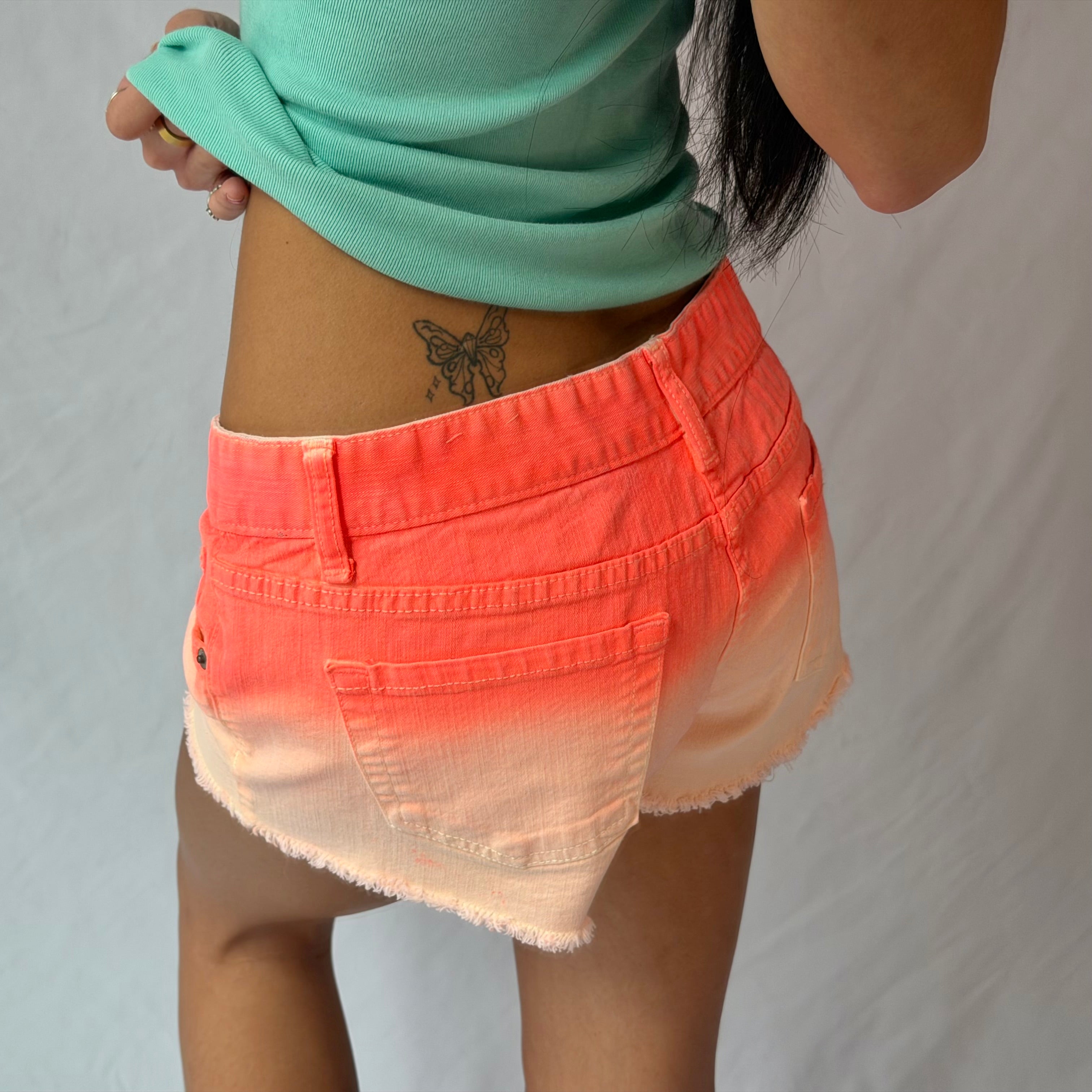 2016 neon orange ombre low rise denim shorts